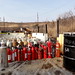 December 2, 2012 - Fire extinguishers, propane tanks organized for disposal.
