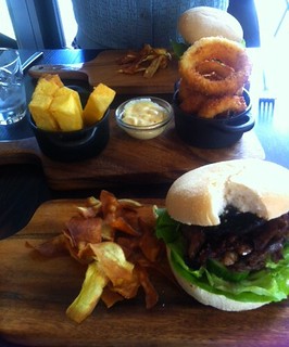 picture of great burgers served on wooden boards