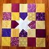 Purple/gold star block for Quilts for Kids