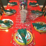 Holiday Table Setting with Gold Chargers