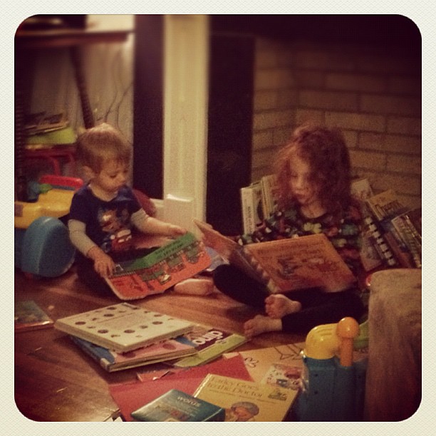 Pictured:  why I can't wait for them to get the kindle for Xmas. THERE ARE BOOKS EVERYWHERE ALL THE TIME.