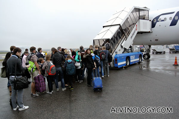 Boarding a smaller Finnair plane to Switzerland 