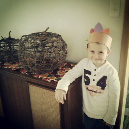 Rex in his feather hat he made at school