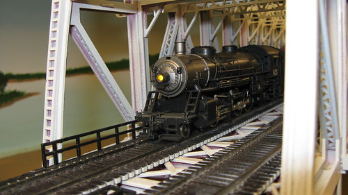H.O Scale steam powered freight train crossing the Missisippi River lift bridge. by Eddie from Chicago