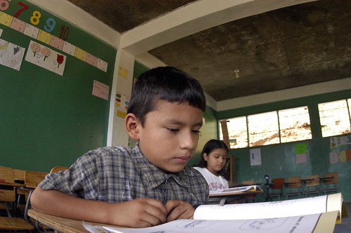 HONDURAS: Child Reads at Desk