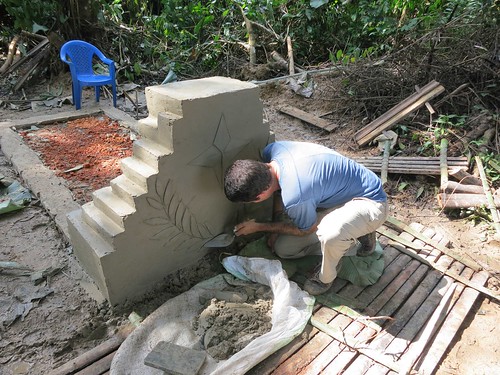 Roger works on the tomb
