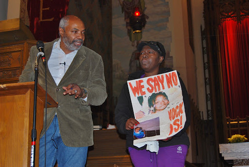 Abayomi Azikiwe, editor of the Pan-African News Wire, introduces Mertilla Jones, the grandmother of slain Aiyana Jones, to the audience at Detroit's MLK Day on Jan. 21, 2013. (Photo: Sharon Black) by Pan-African News Wire File Photos
