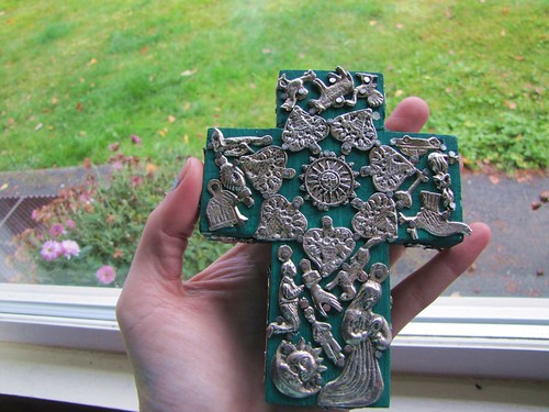 teal and silver cross