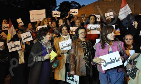 Dozens of Egyptian women demonstrating against the draft constitution on the way to being adopted by the voters inside the country. Many have rejected the vote surrounding the referendum. by Pan-African News Wire File Photos