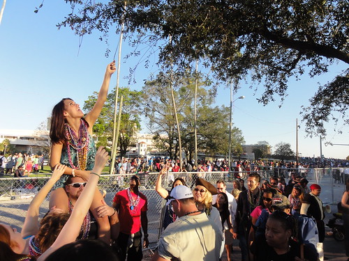Drunk girl helps drunks get beads out of tree
