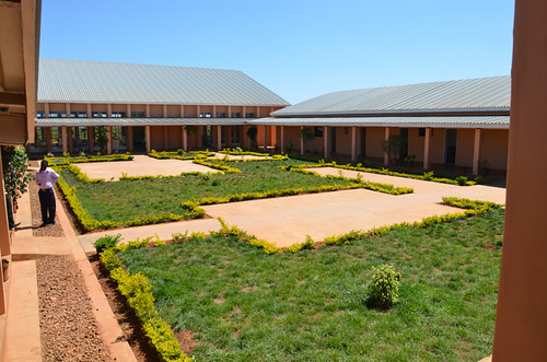A staff member walks through the Dowa Teachers Training College courtyard. The college helps satisfy an urgent need for qualified educators in Malawi and brings the country closer to meeting the United Nations’ Millennium Development Goal of universal primary education. (Courtesy Photo)