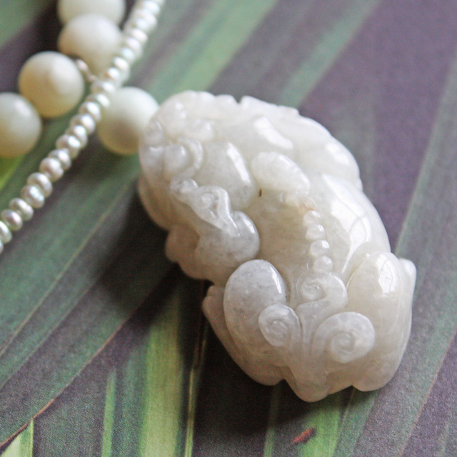 jade dragon necklace closeup