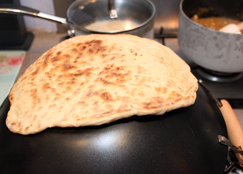 Cooking Naan on a wok