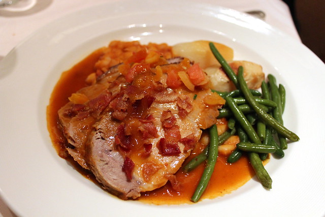 Hawaiian Luau Pork with Apricot Drippings served with a white bean and smoked bacon ragout, roast potatoes