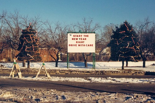 The twin evergreen trees along the east side of South Kedzie Avenue near West 93rd Street. (Gone.)  Evergreen Park Illinois.  Early January 1988. by Eddie from Chicago