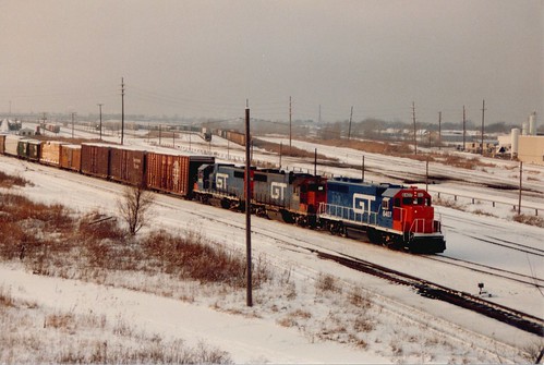 Eastbound Grand Trunk Western Railroad freight train waiting to depart from the Belt Railway of Chicago's Clearing Yard.  Chicago Illinois.  January 1987. by Eddie from Chicago