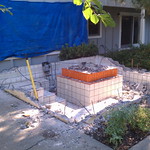 Backyard concrete fountain demolition and removal.