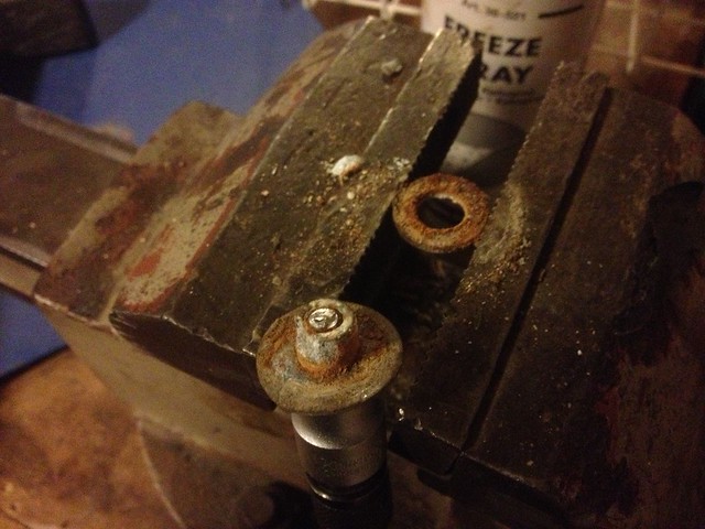Front fender bolt fused with washer
