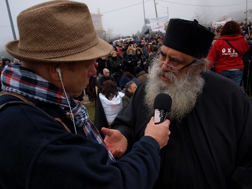 Greek priest for town protesting controversial mining project speaks to press by Teacher Dude's BBQ