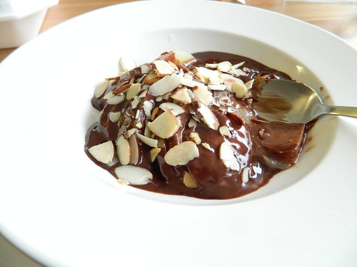 Poached Pear with Ganache and Slivered Almonds