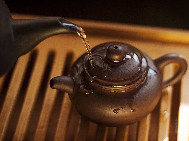 warming the teapot.