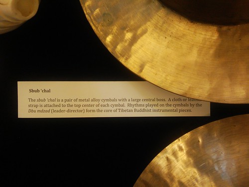 Sbub 'chal -  The sbub 'chal is a pair of metal alloy cymbals with a large central boss. A cloth or leather strap is attached to the top center of each cymbal. Rhythms played on the cymbals by the Dbu mdzad (leader-director) form the core by Wonderlane