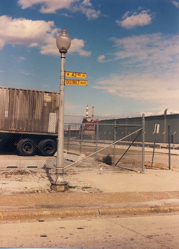 Chicago's yellow street signs of the past in an industrial park.  Chicago Illinois.  October 1989. by Eddie from Chicago