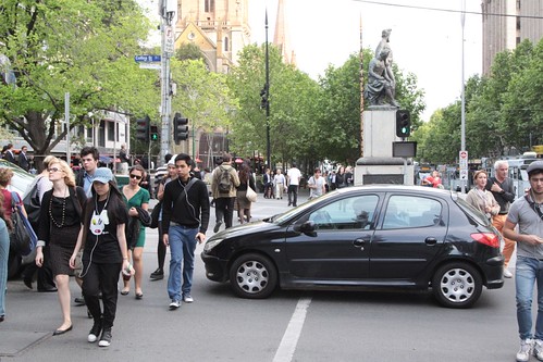 Dimwit blocks the pedestrian crossing at Swanston and Collins Streets