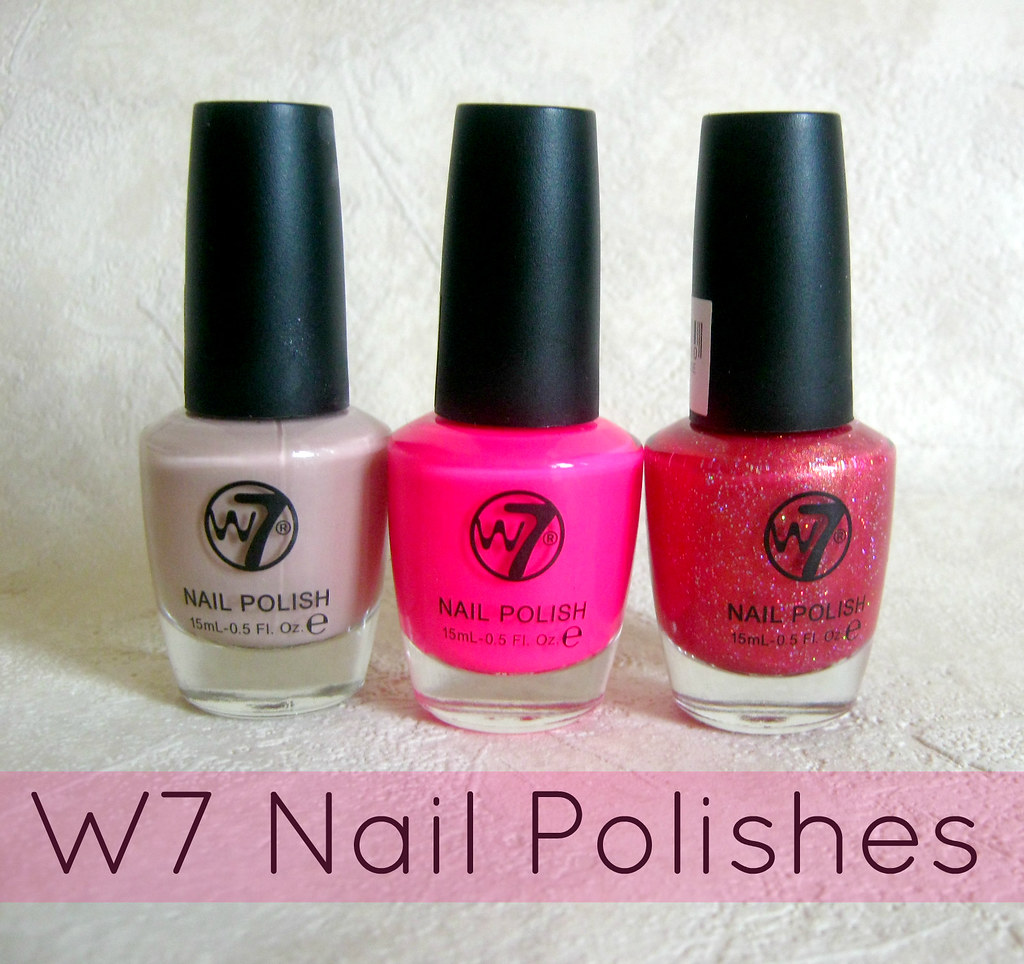 A picture of W7 nail polishes in Cafe Au lait, Space Debris and It's Pink. 
