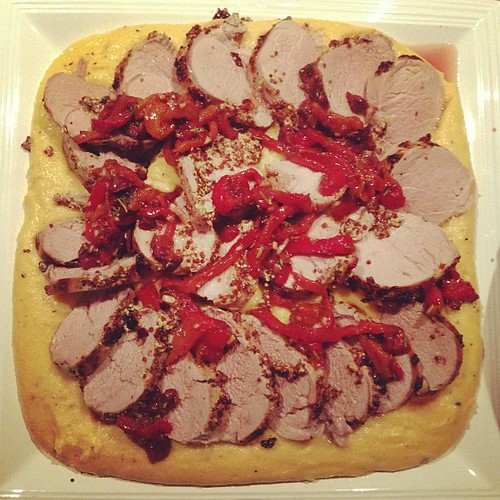 Roast pork with polenta and balsamic roasted peppers.
