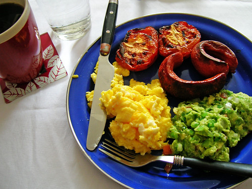 scrambled eggs, broiled tomatoes and hotdogs, and chicago style guacamole