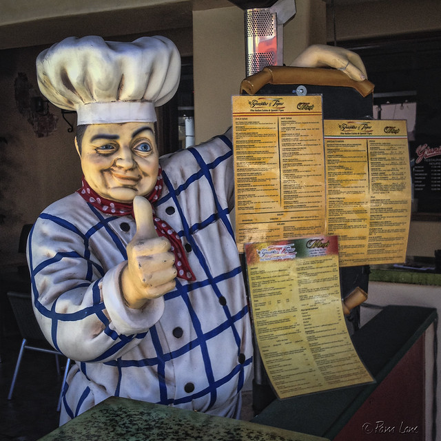 Granata's Tapas waiter statue