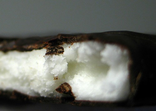 Photo: closeup of a York peppermint patty chocolate outside white inside