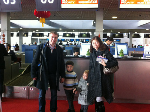 Checking in for our flight from China to Vancouver