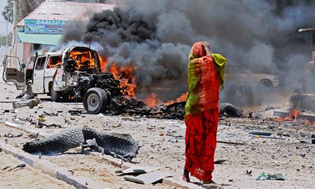 A woman near the site of the car bomb in Mogadishu, the capital of Somalia. Despite claims by the US-backed government, war continues.  by Pan-African News Wire File Photos