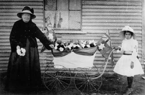 Selling flowers to raise funds for the Red Cross, Thargomindah, ca. 1916 by State Library of Queensland, Australia