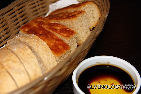Fresh bread with olive oil and balsamic vinegar 