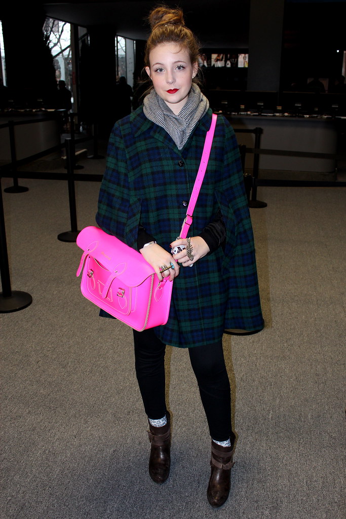 fluorescent pink satchel and plaid cape