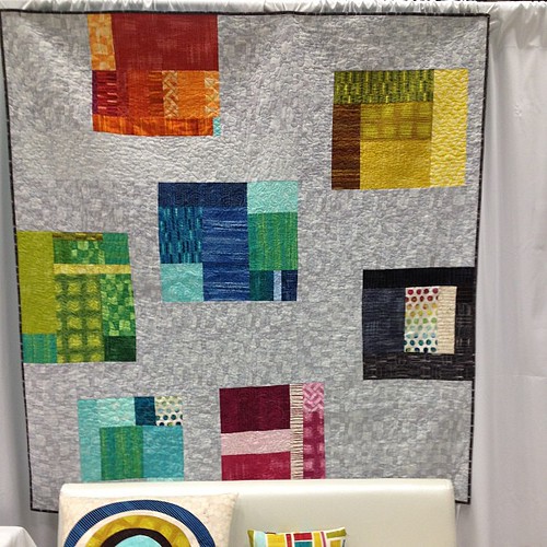 My quilt is in the @michaelmillerfabrics booth! Fabric is #edges by @lauragunnstudio #quiltcon