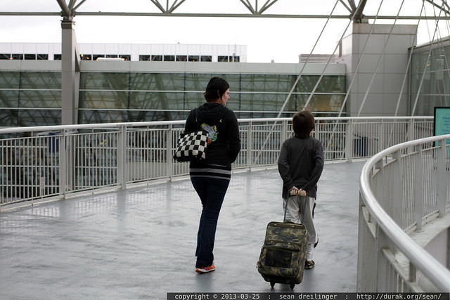 unaccompanied minors, accompanied by their mom, heading into the pdx portland international air terminal - _MG_3655