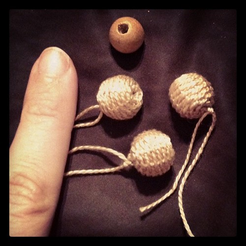 Thread covered buttons for a new court doublet.