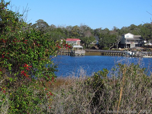A peek-a-boo view of the Intercoastal Waterway along a Marsh Loop, Holden Beach, North Carolina