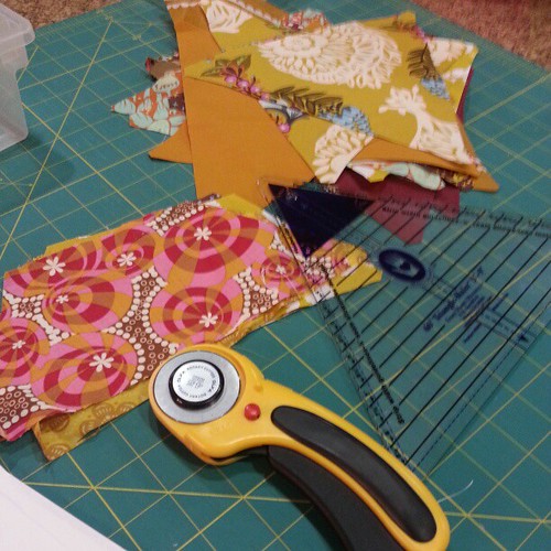 Spent the evening cutting gold/brown fabrics for patchwork prism quilt