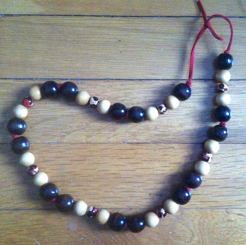 Necklace with Wooden Beads on Red Suede Cord by randubnick