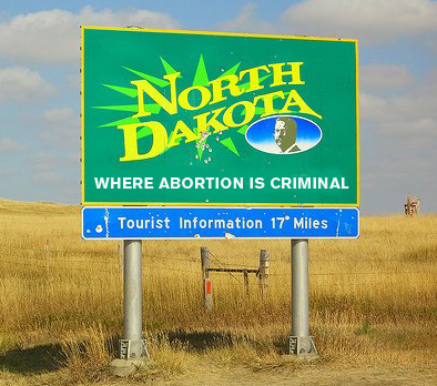 North Dakota welcome sign: Where abortion is criminal