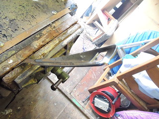 Curved spatula shaft