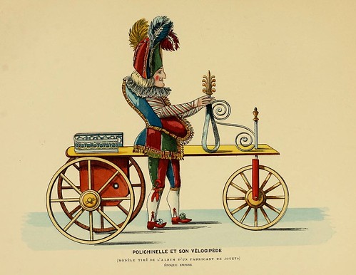 018-Polichinela con su bicicleta-Epoca Imperio-Histoire des jouets….1902- Henry René d’ Allemagne
