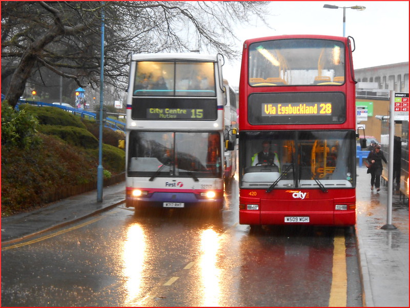 FDC Dennis Trident 32717 W717RHT passes Plymouth Citybus PVL 420 W509WGH at a very wet Derriford Hospital.