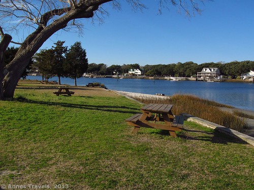 Picnic tables along the Intercoastal Waterway at Sailfish Street Park, Holden Beach, North Carolina