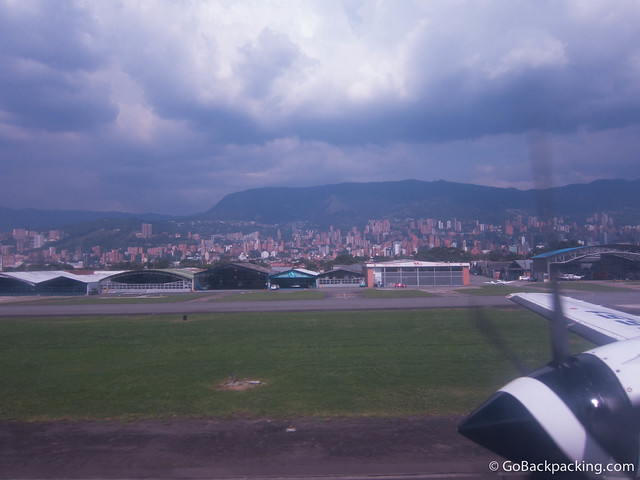 Landing at OH Airport, Poblado can be seen to the east (right)